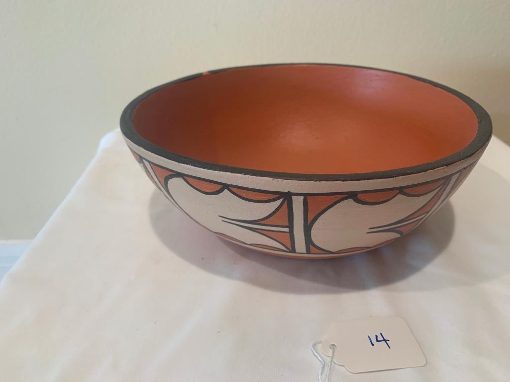 Black and cream on red bowl with traditional Santo Domingo design