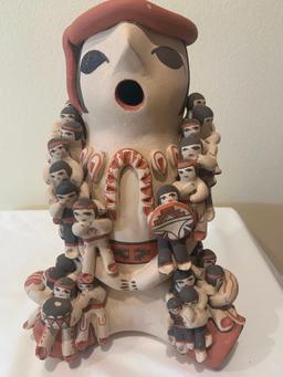 Ceramic polychrome storyteller with twenty + children