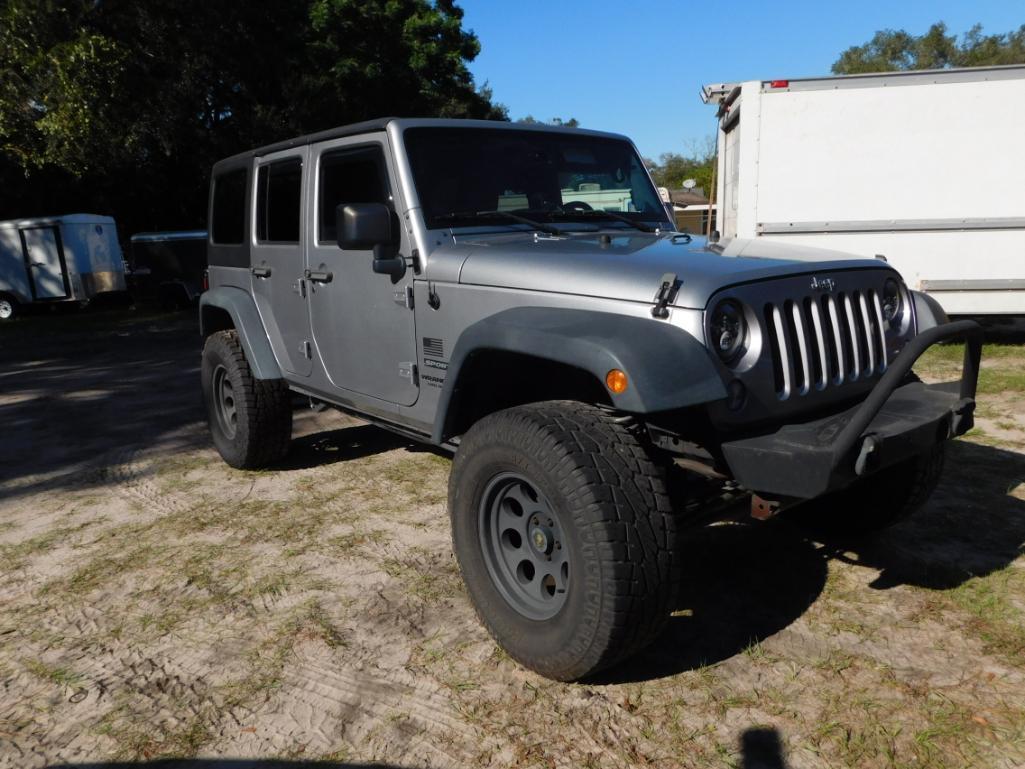 2014 Jeep Wrangler Unlimited Multipurpose Vehicle (MPV), VIN # 1C4BJWDG7EL251362