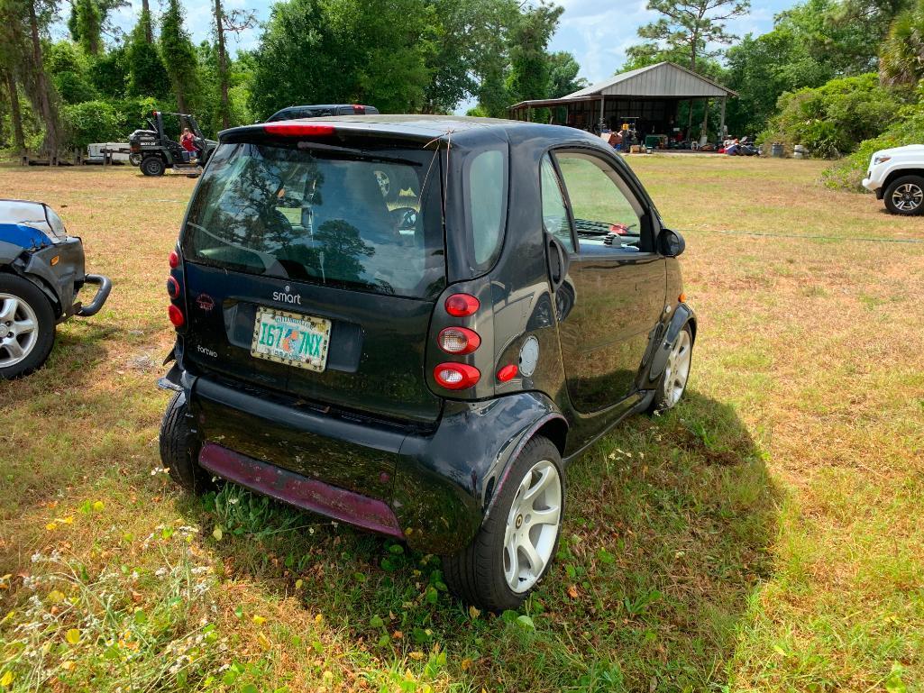 2006 Smart Car Le Car (uodated year and mileage)