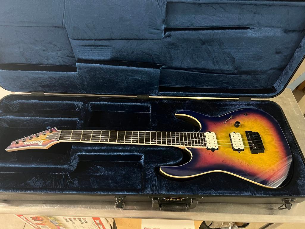 Ibanez RGIX6PDLB IP-01 electric guitar (s/n I17124866) in Schecter Guitar Research hard case.