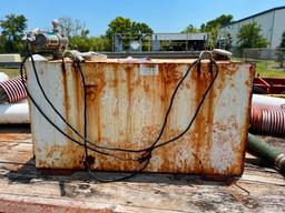 fuel tank with pump (showing some rust).