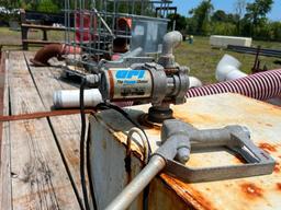 fuel tank with pump (showing some rust).