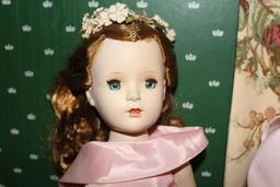 A Vintage Vinyl Doll, and a Porcelain Doll Marked Pat Secrest