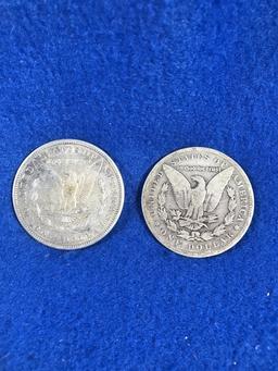 (2) Morgan Silver Dollars