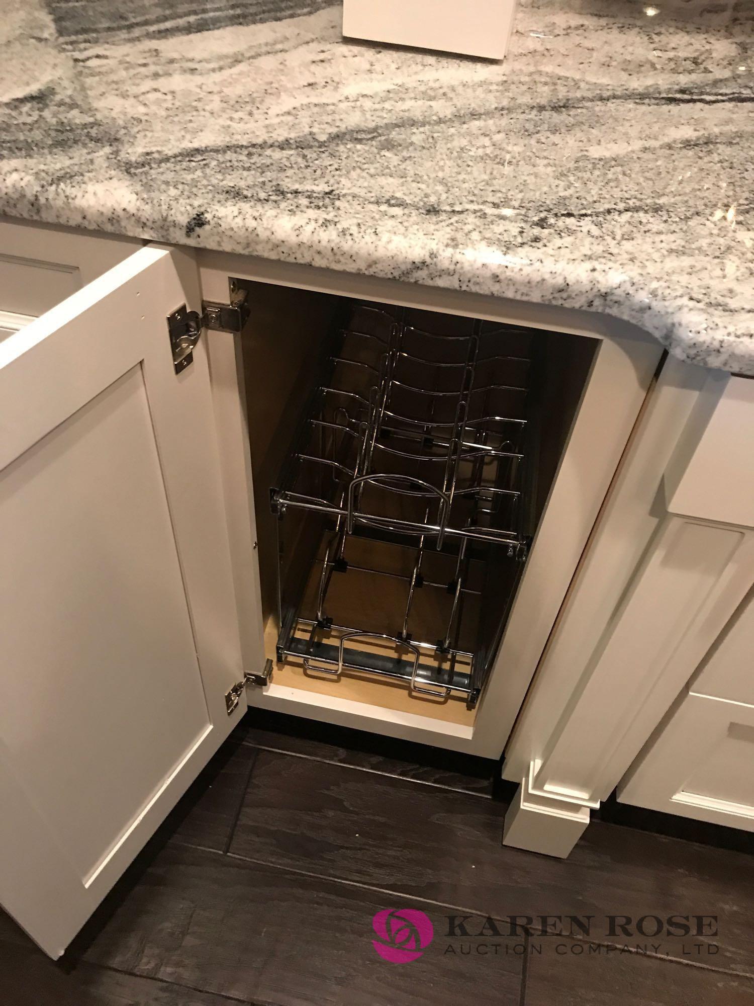 White Luxury kitchen and cabinets display with granite top