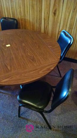 51 inch round Table with four cushioned chairs