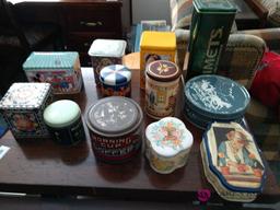 12 advertising tins