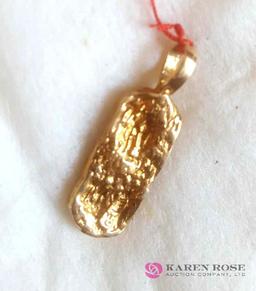 14 karat gold charm