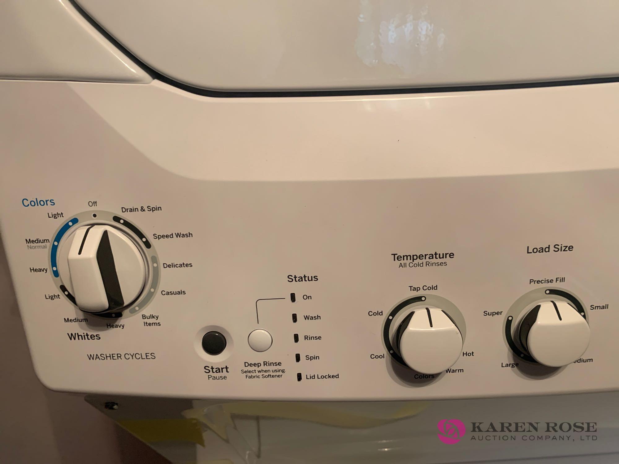 Brand new GE stacking washer and dryer