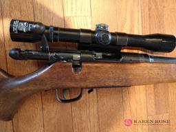 Remington 222 rifle with scope into clips