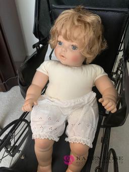 Vintage doll buggy and baby doll