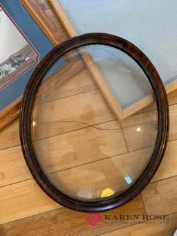 Vintage oval beveled glass frame plus other frames