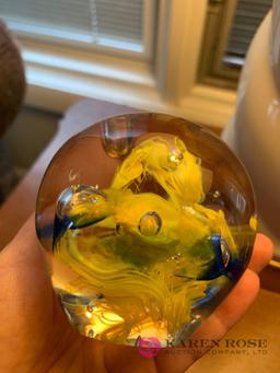 Glass paperweight signed