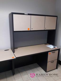 Black shelf and room of desks