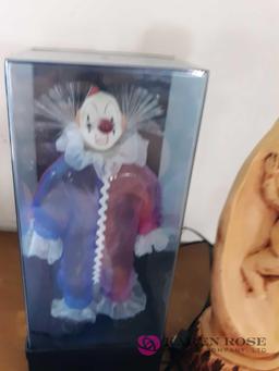 Statue and fiberoptic clown musical box