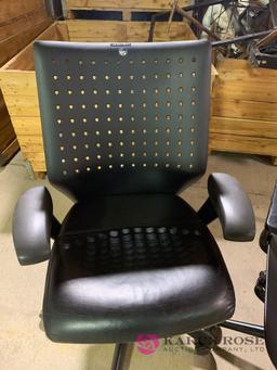 Two black computer chairs
