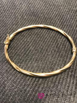 14kt gold Italy twist bangle hinged bracelet