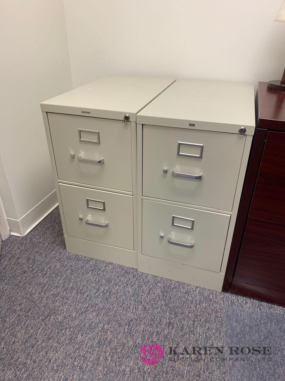 Two filing cabinets one with key room #4