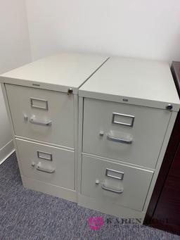 Two filing cabinets one with key room #4