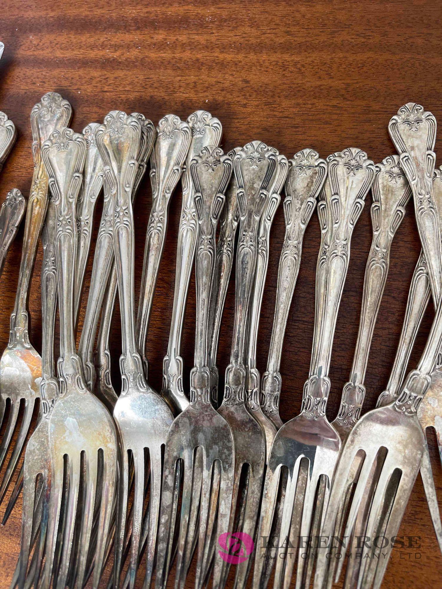 Large lot of flatware marked nickel silver