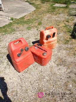 Three 6 gallon outboard motor fuel tanks