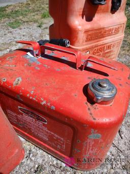 Three 6 gallon outboard motor fuel tanks