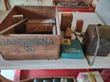 vintage advertising box with contents including heater and more