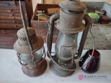 two vintage lanterns and one globe