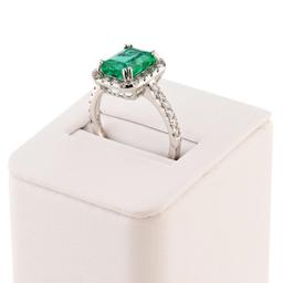 APP: 19.8k *2.38ct Emerald and 0.66ctw Diamond Platinum Ring (Vault_R12 45151)