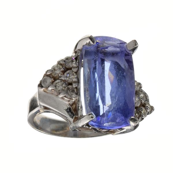 APP: 24.3k 14KT. White Gold, 9.85CT Rectangular Cushion Cut Tanzanite And 0.48CT Diamond Ring