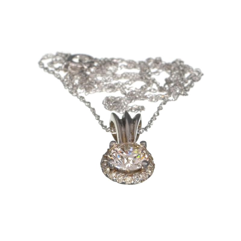 APP: 5k 14KT. White Gold, 1.19CT Round Cut Diamond Pendant