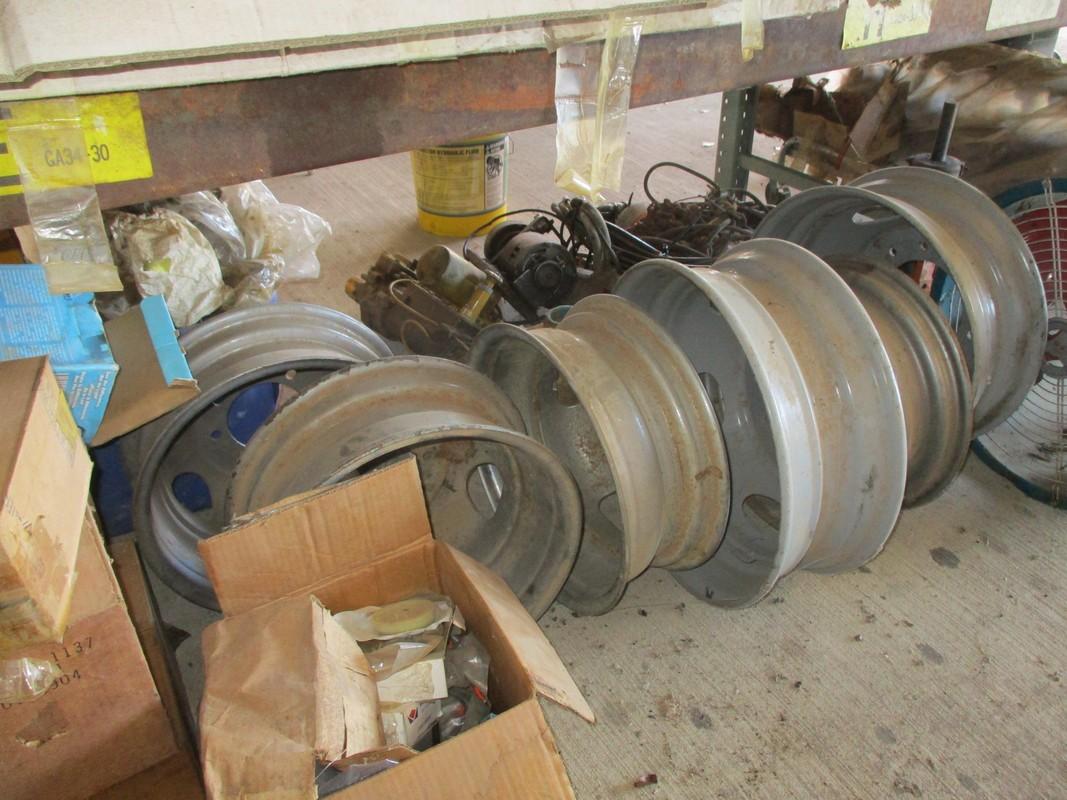Contents under shelf,filter,dually wheels,breaker boxes,electric winches,1/2 ton chain hoist and mis