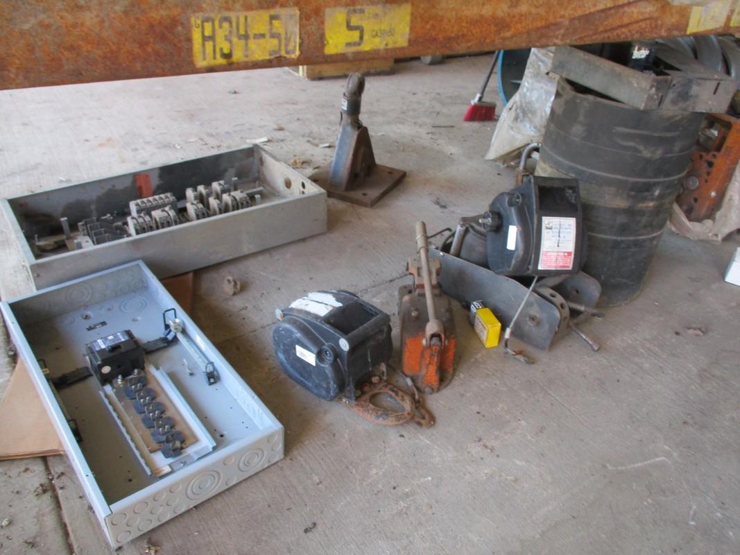 Contents under shelf,filter,dually wheels,breaker boxes,electric winches,1/2 ton chain hoist and mis