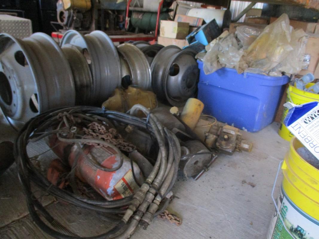 Contents under shelf,filter,dually wheels,breaker boxes,electric winches,1/2 ton chain hoist and mis