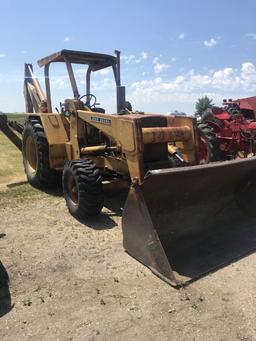 JD Model 510 loader backhoe