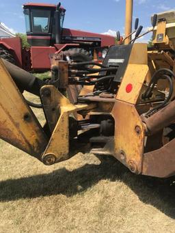 JD Model 510 loader backhoe