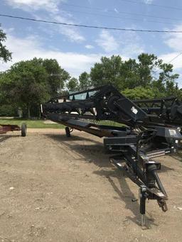 Pull type MacDon swather, 30’ finger reel