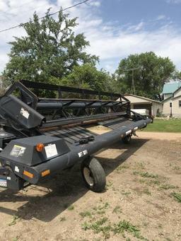 Pull type MacDon swather, 25’ bat reel