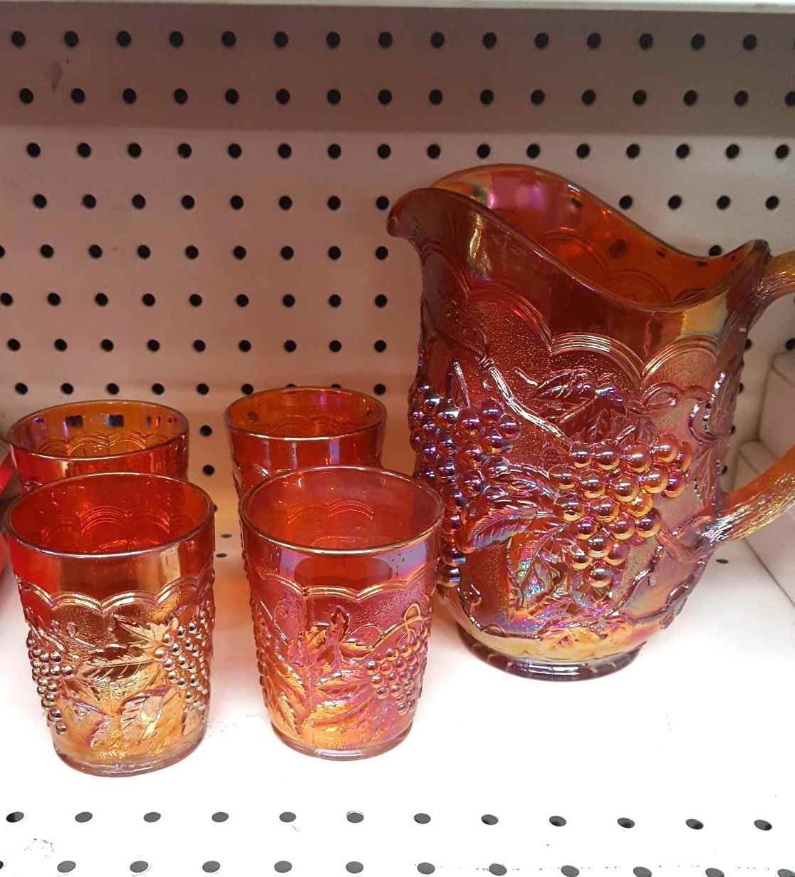 Carnival glass pitcher with 4 glasses