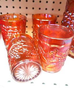 Carnival glass pitcher with 4 glasses
