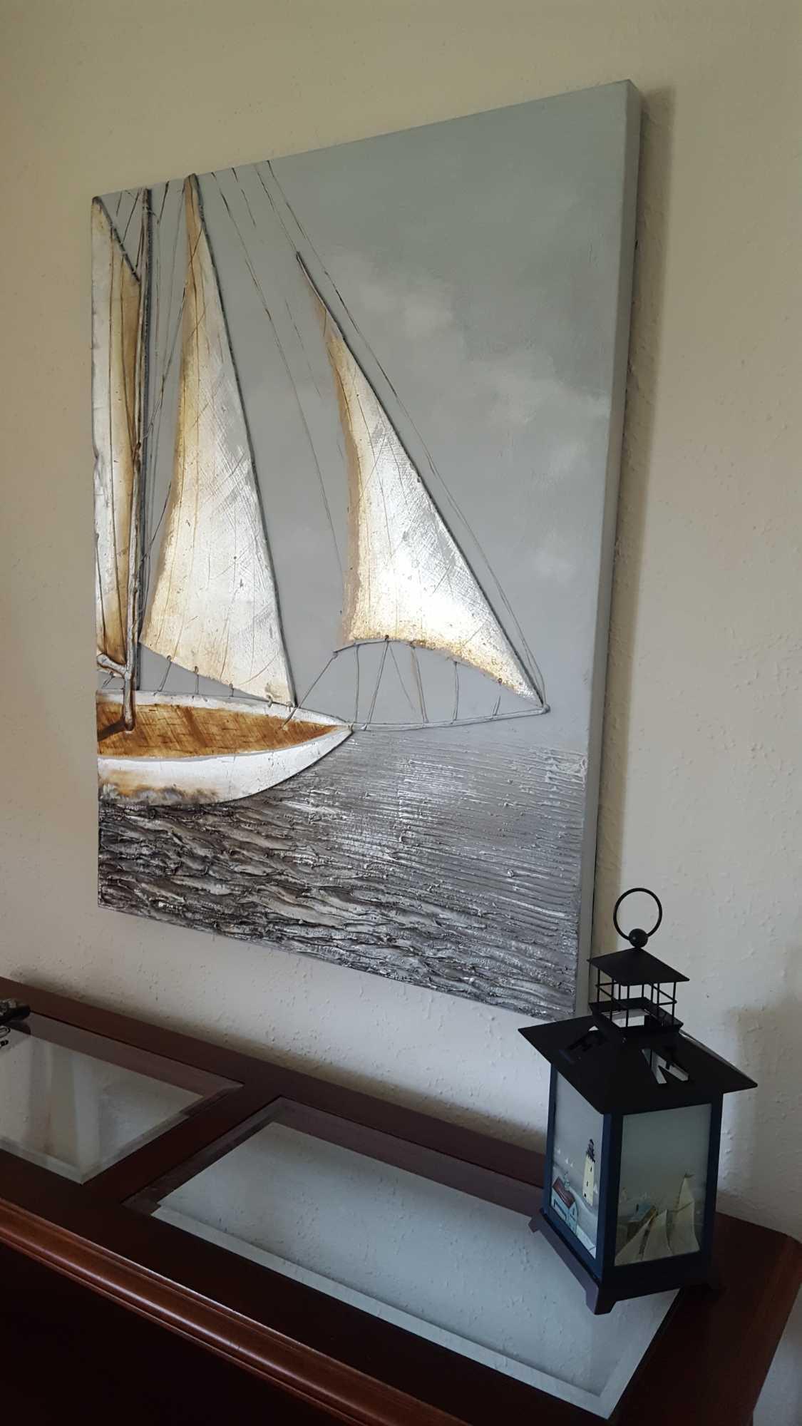 Sailboat artwork and Lantern