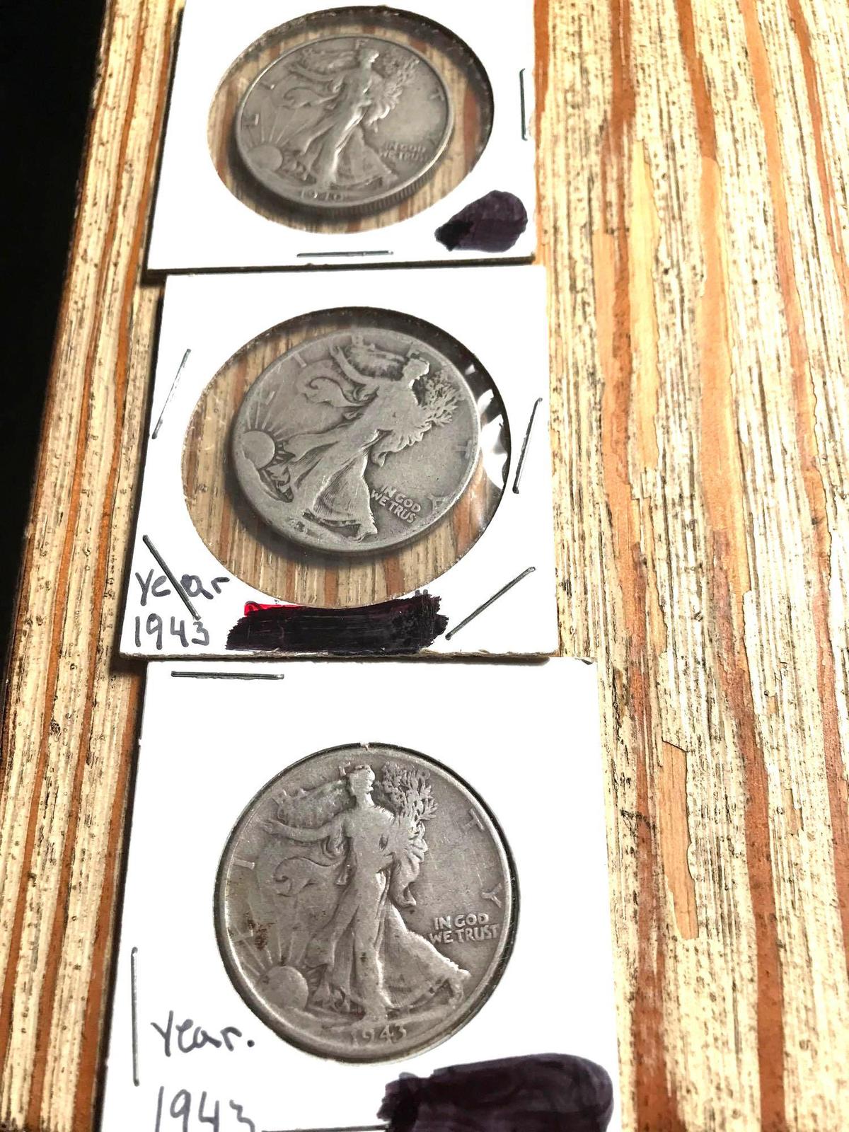 ThreeWalking liberty half dollars