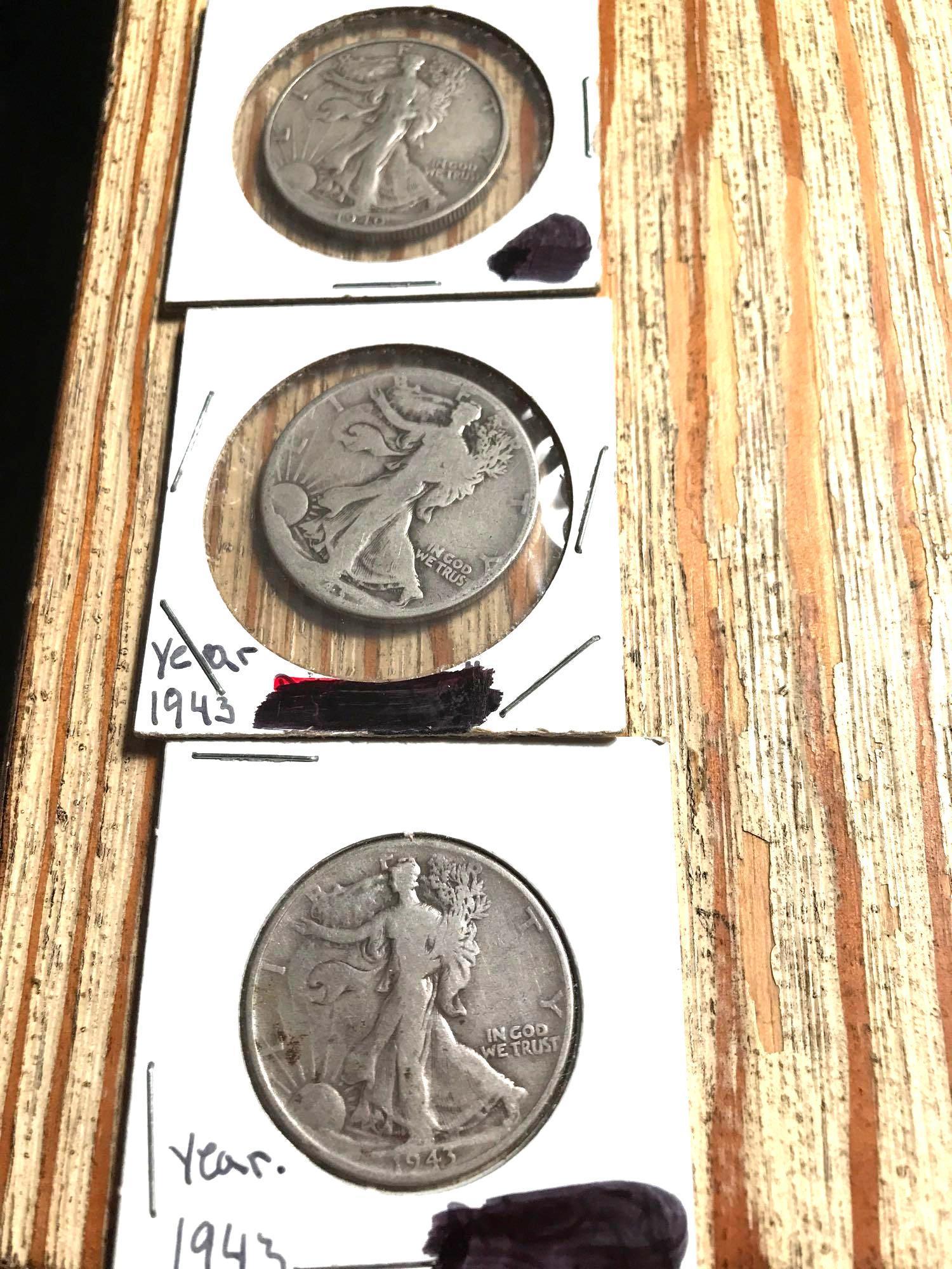 ThreeWalking liberty half dollars