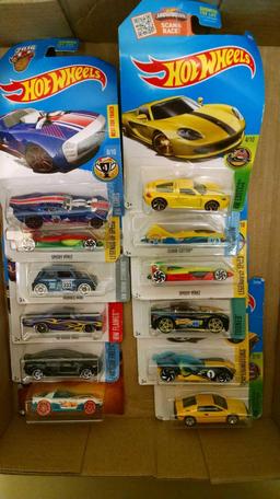 12 Hot Wheels cars new on cards