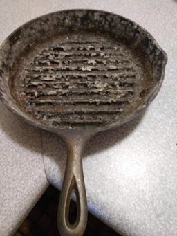 2 cast iron frying pans