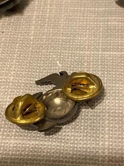 Lot of seven military pins