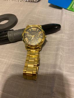Gold color three dial Geneva watch