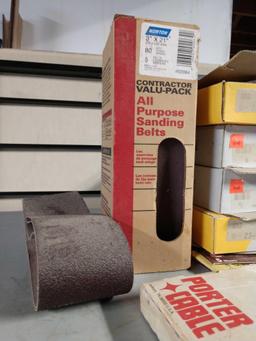 Sandpaper lot including sanding belts, disc, sheets, with metal storage