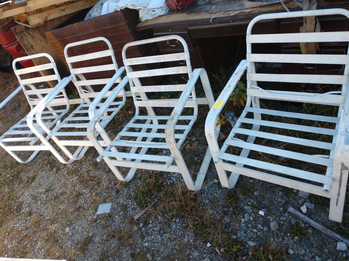 Four patio chairs